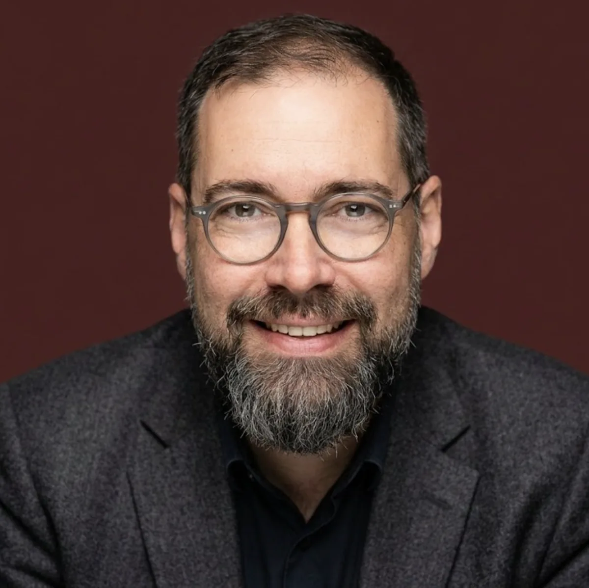 "A professional, high-resolution profile photo, maintaining...